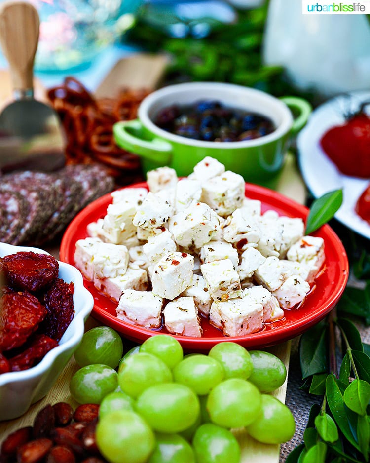 marinated feta as part of a spread with grapes