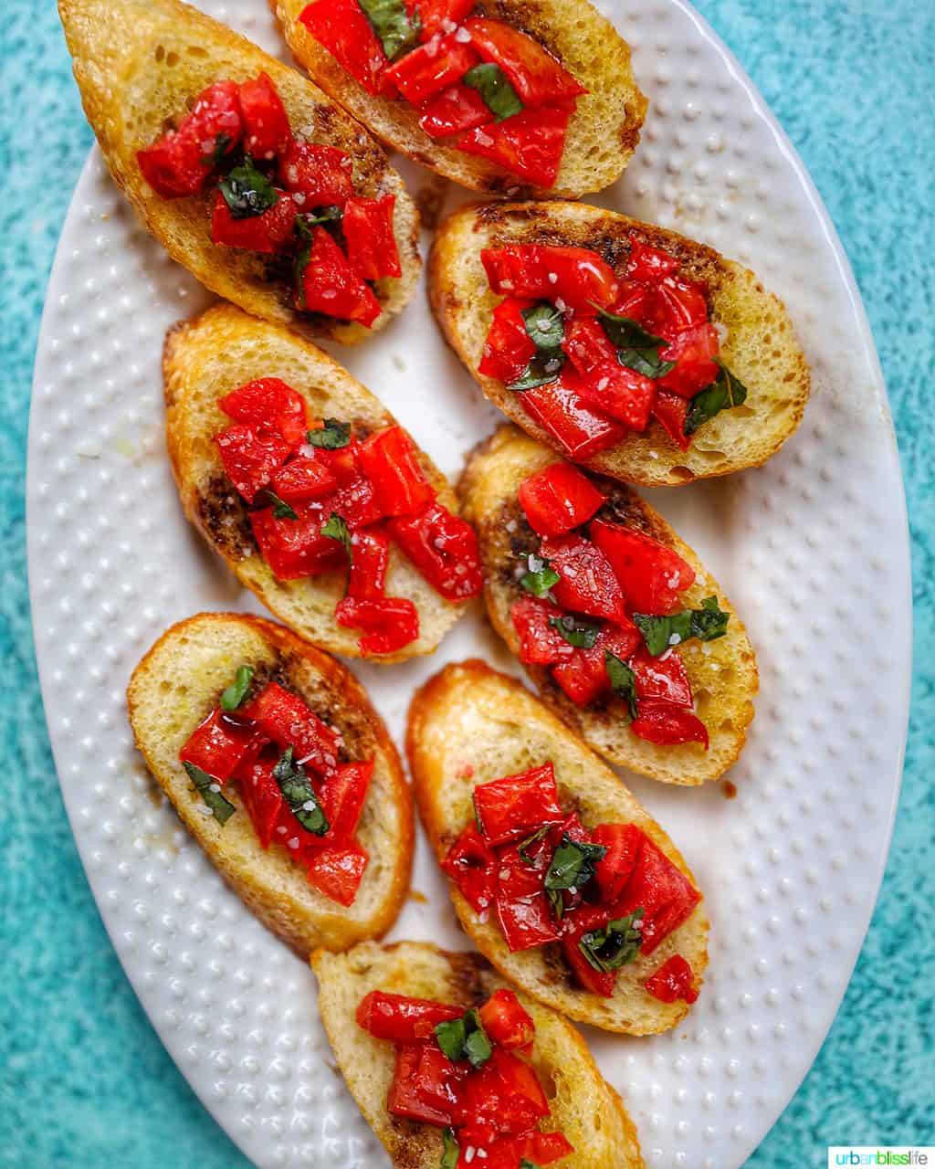 full plate of tomato bruschetta with balsamic vinegar