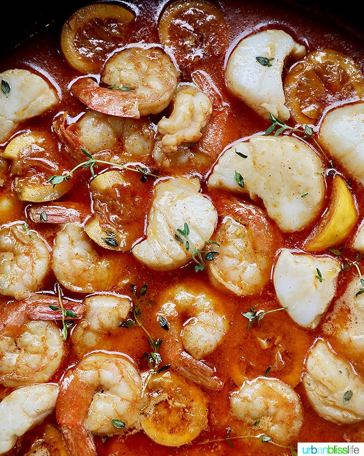 closeup of New Orleans-style BBQ shrimp and scallops