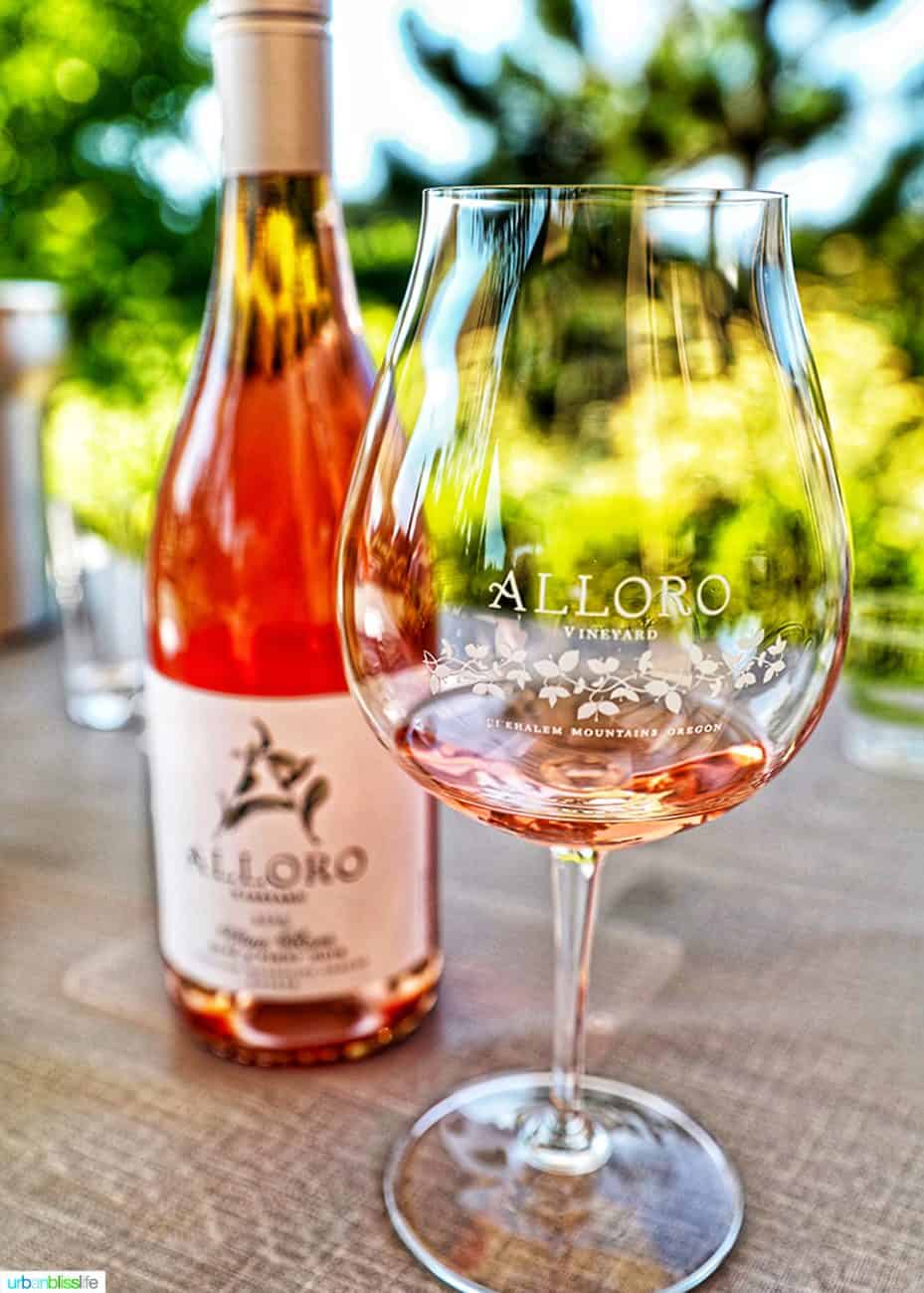 Glass and bottle of Alloro Vineyards rose