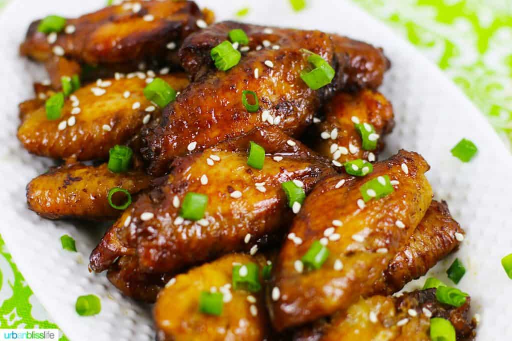 landscape photo of plate full of teriyaki chicken wings