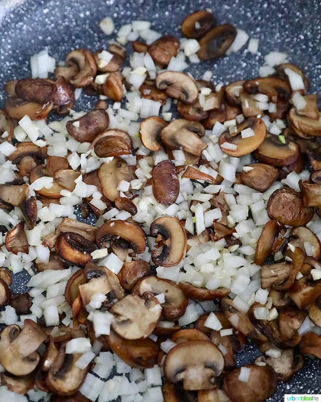 cooking mushrooms and onions