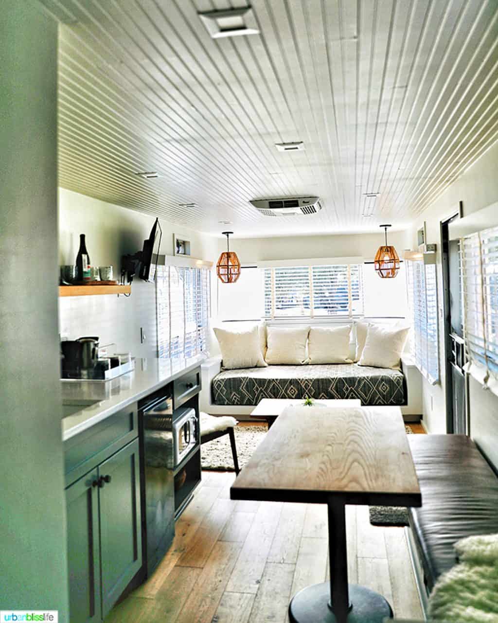 sitting area and kitchenette in vintages trailer resort mansion airstream