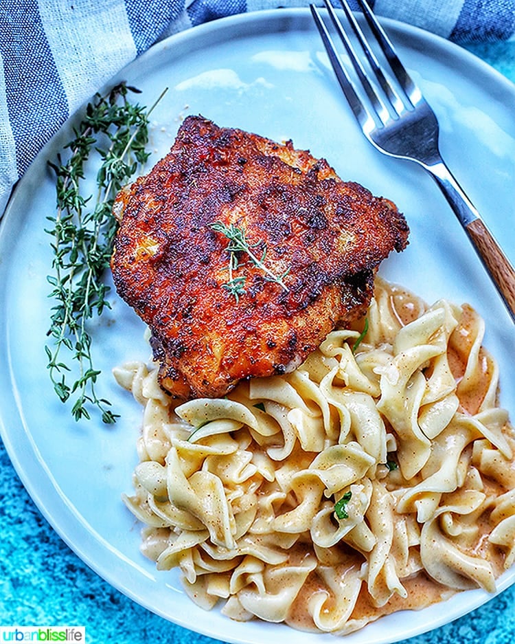 plate of air fryer paprika chicken with paprika pasta