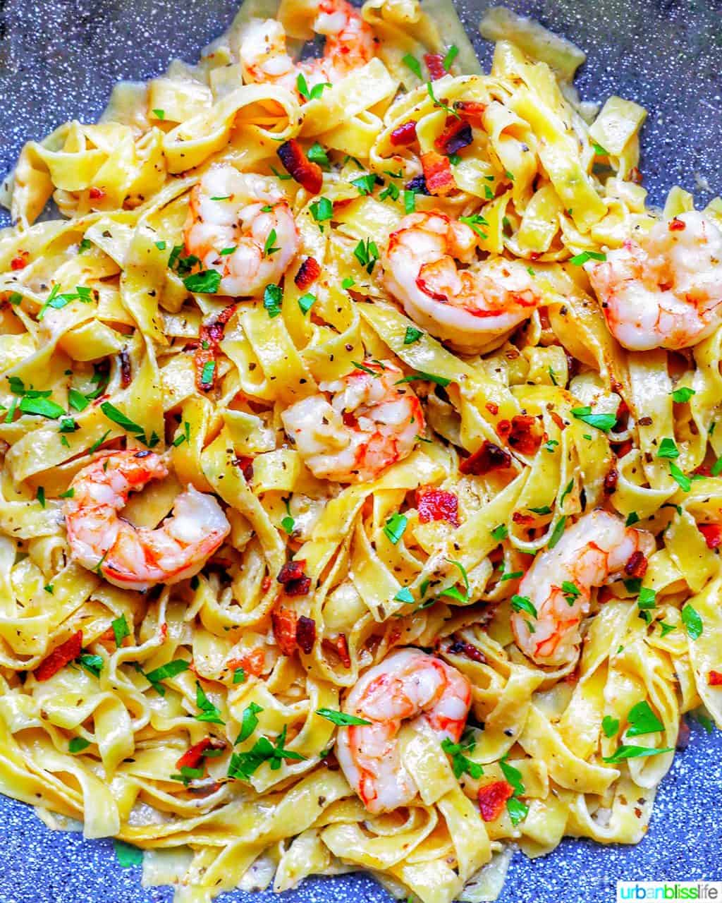 full photo of bacon shrimp pasta in pan