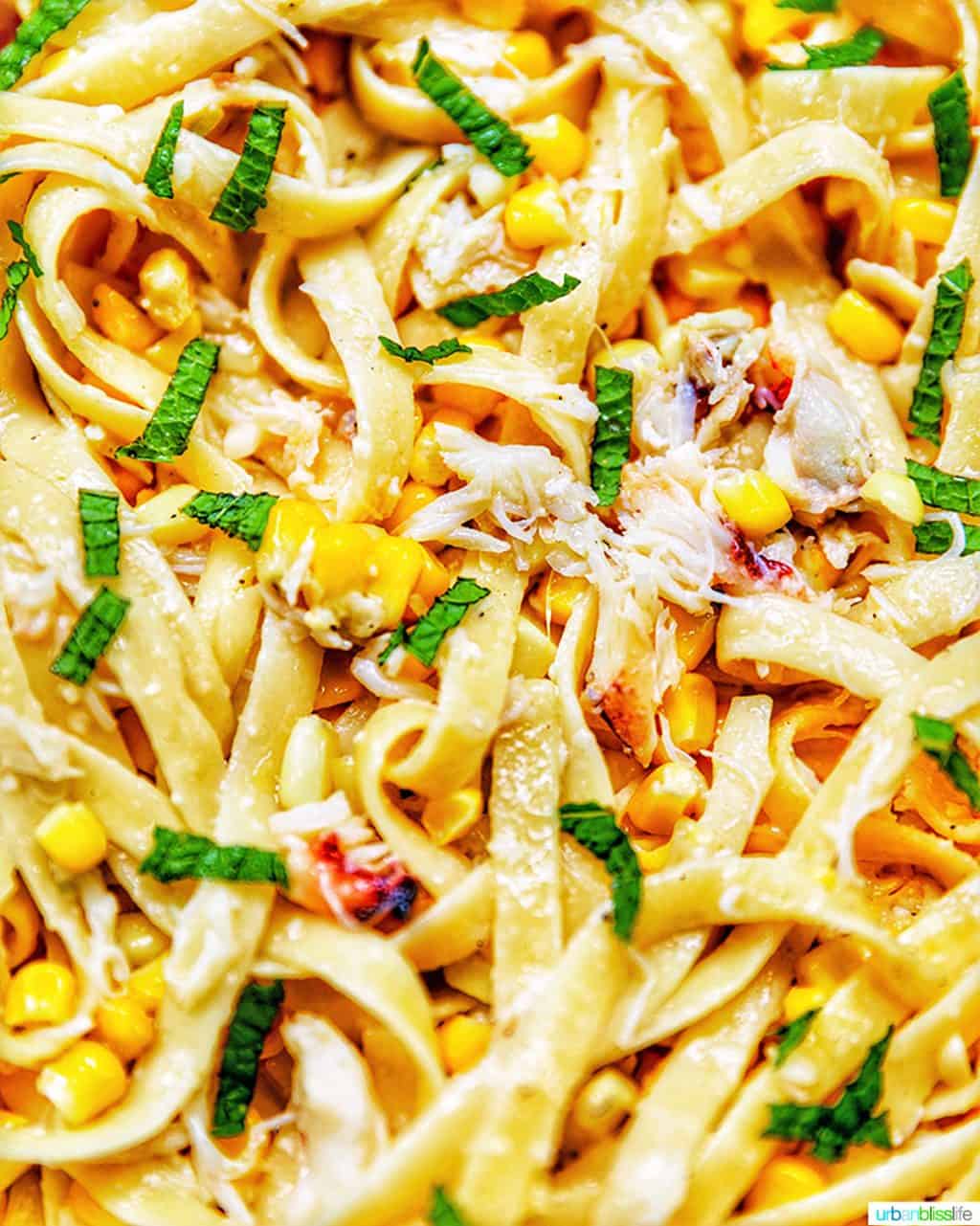 zoom in of pasta with crab and corn