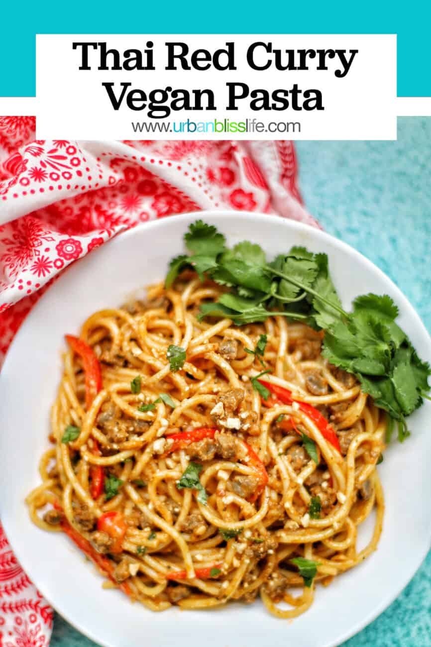 single bowl of Thai Red Curry Pasta with red napkin blue background and title text