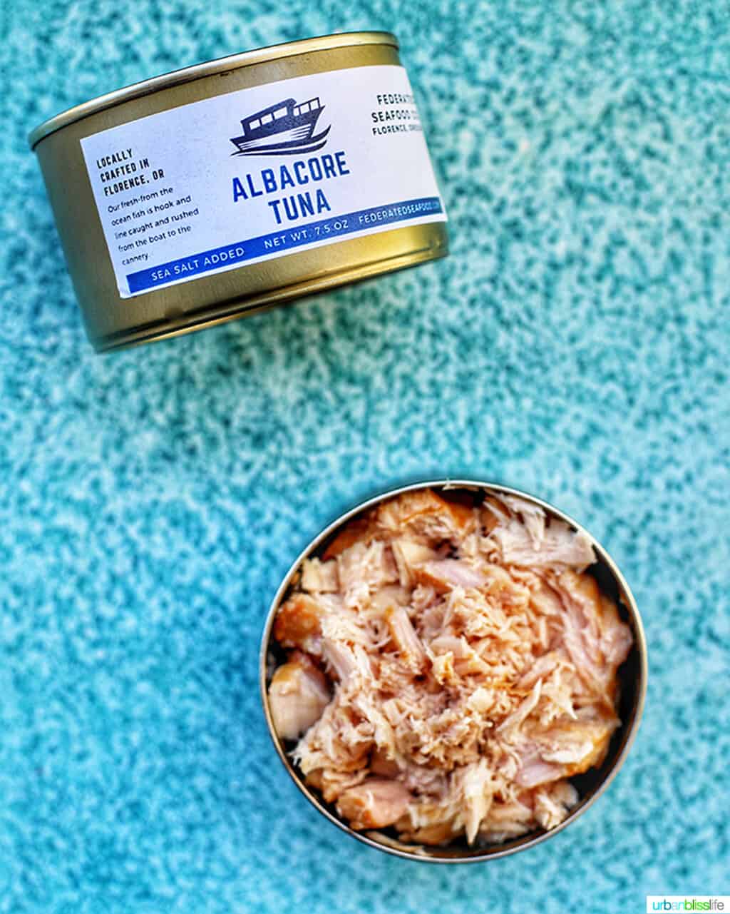 canned albacore tuna on blue background