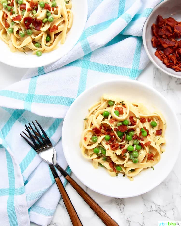 two bowls of Fettuccine with Bacon and Peas