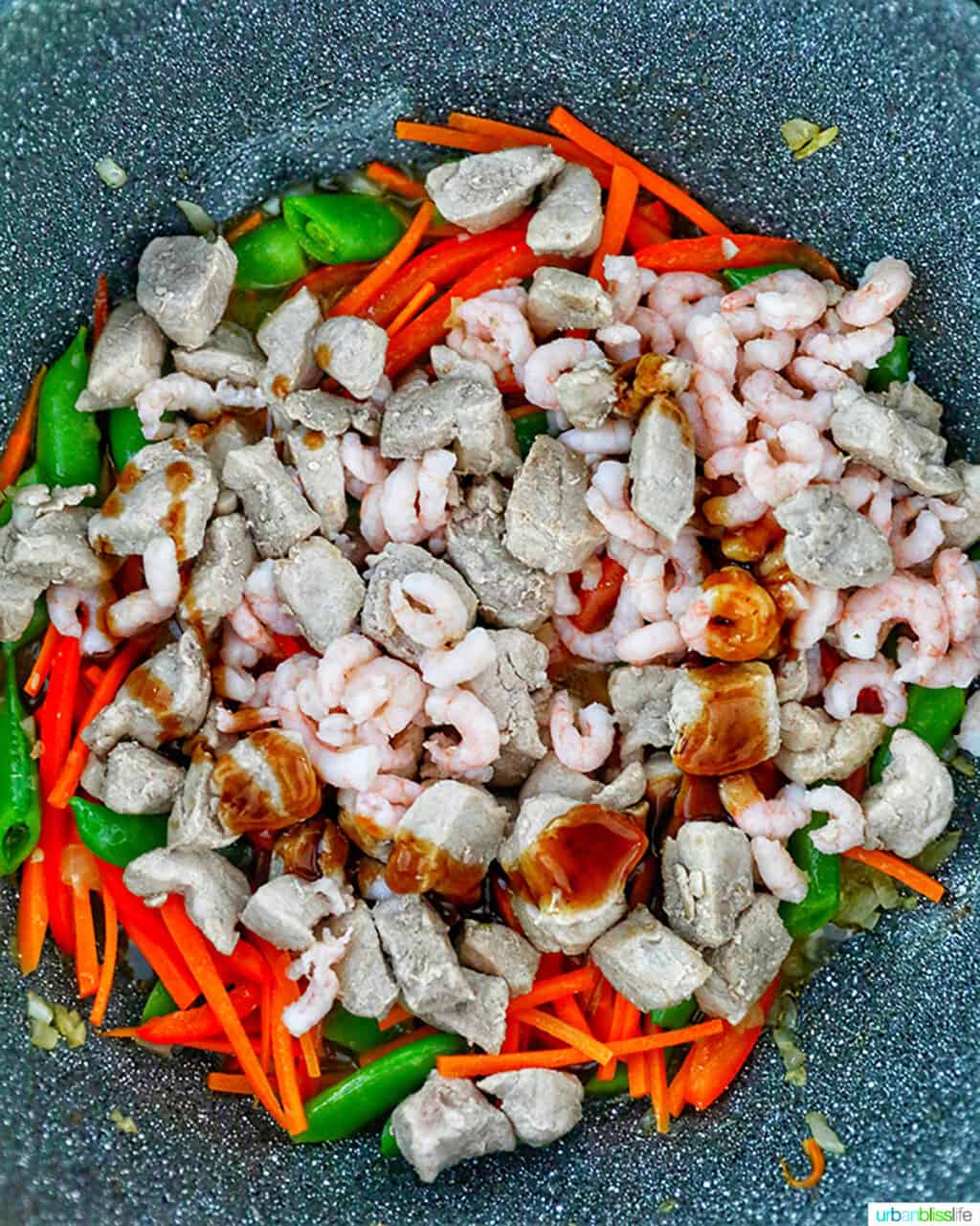 ingredients in wok for Filipino Pancit Bihon