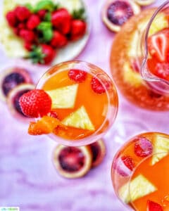glasses of tropical sangria and fruit