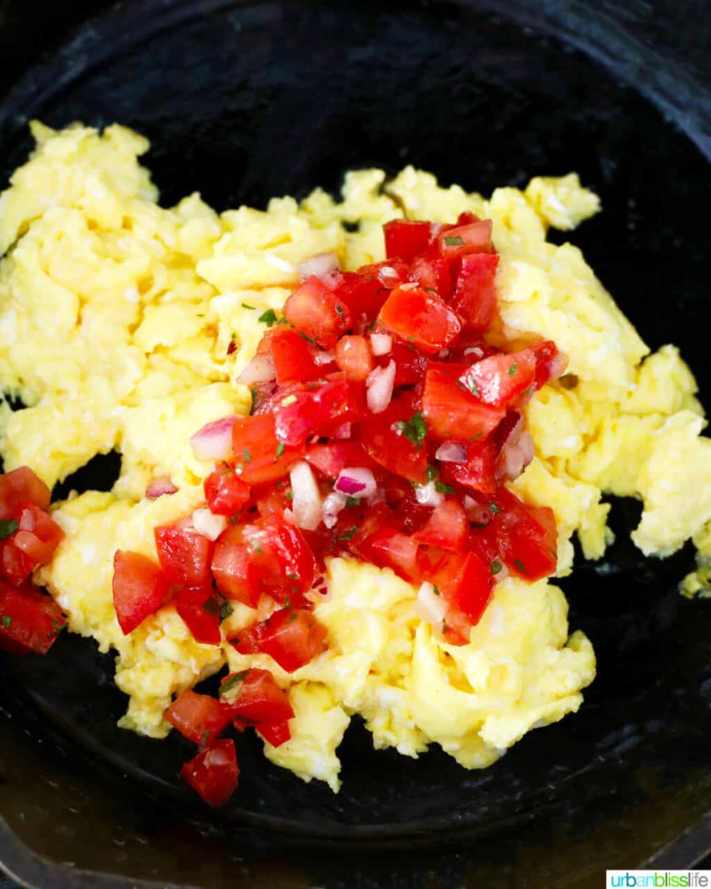 eggs with salsa in skillet