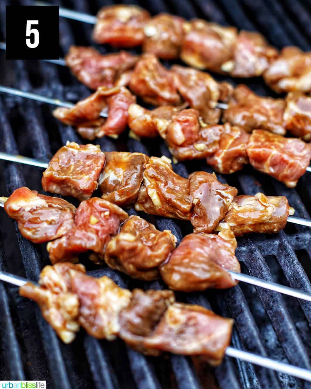 Filipino BBQ pork skewers on the grill