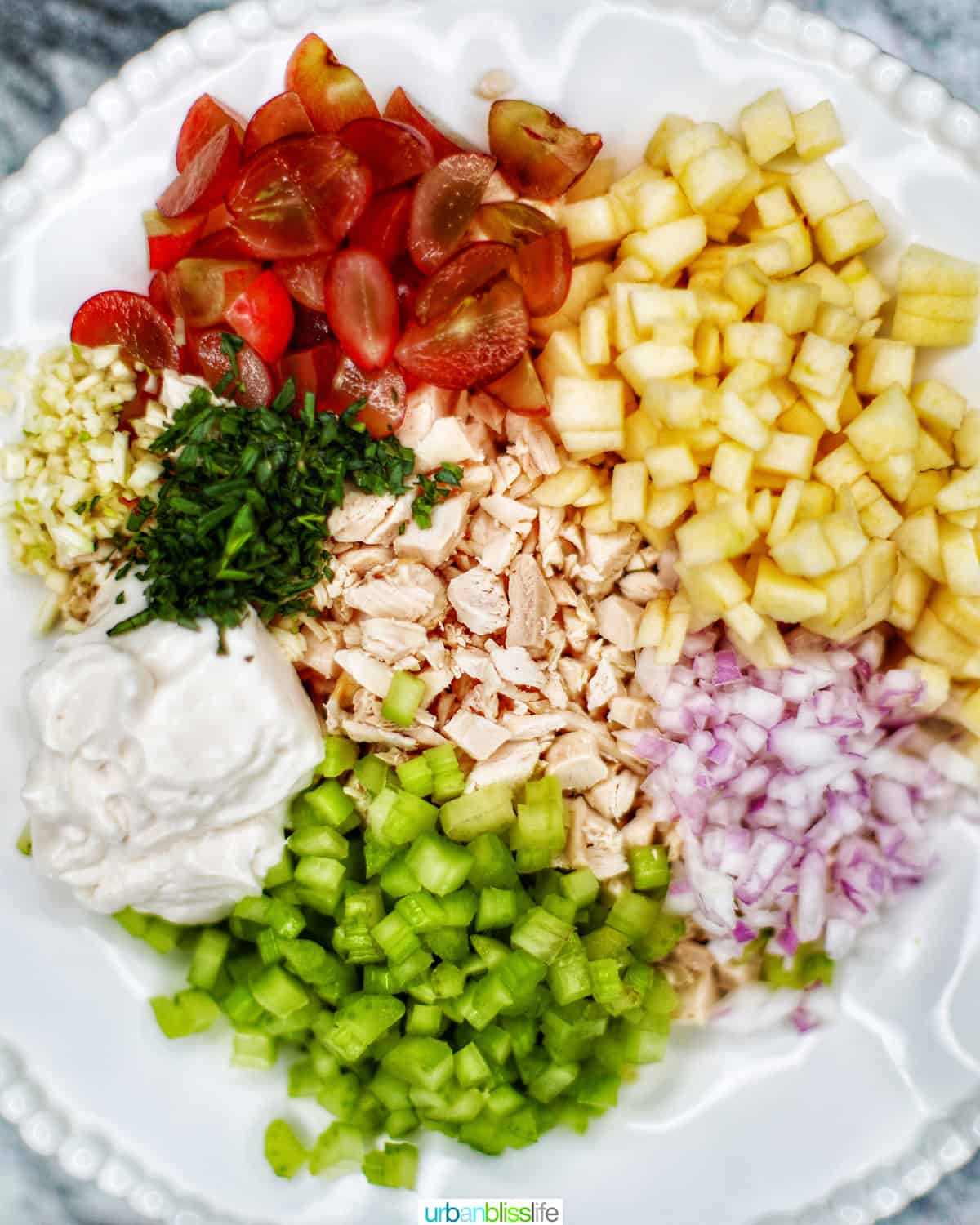 bowl of ingredients for chicken salad sandwiches