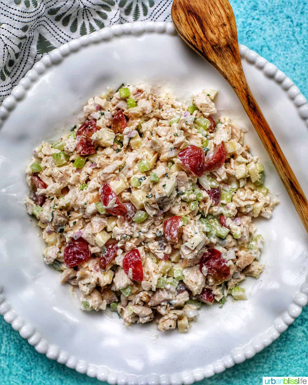 chicken salad in a bowl with spoon