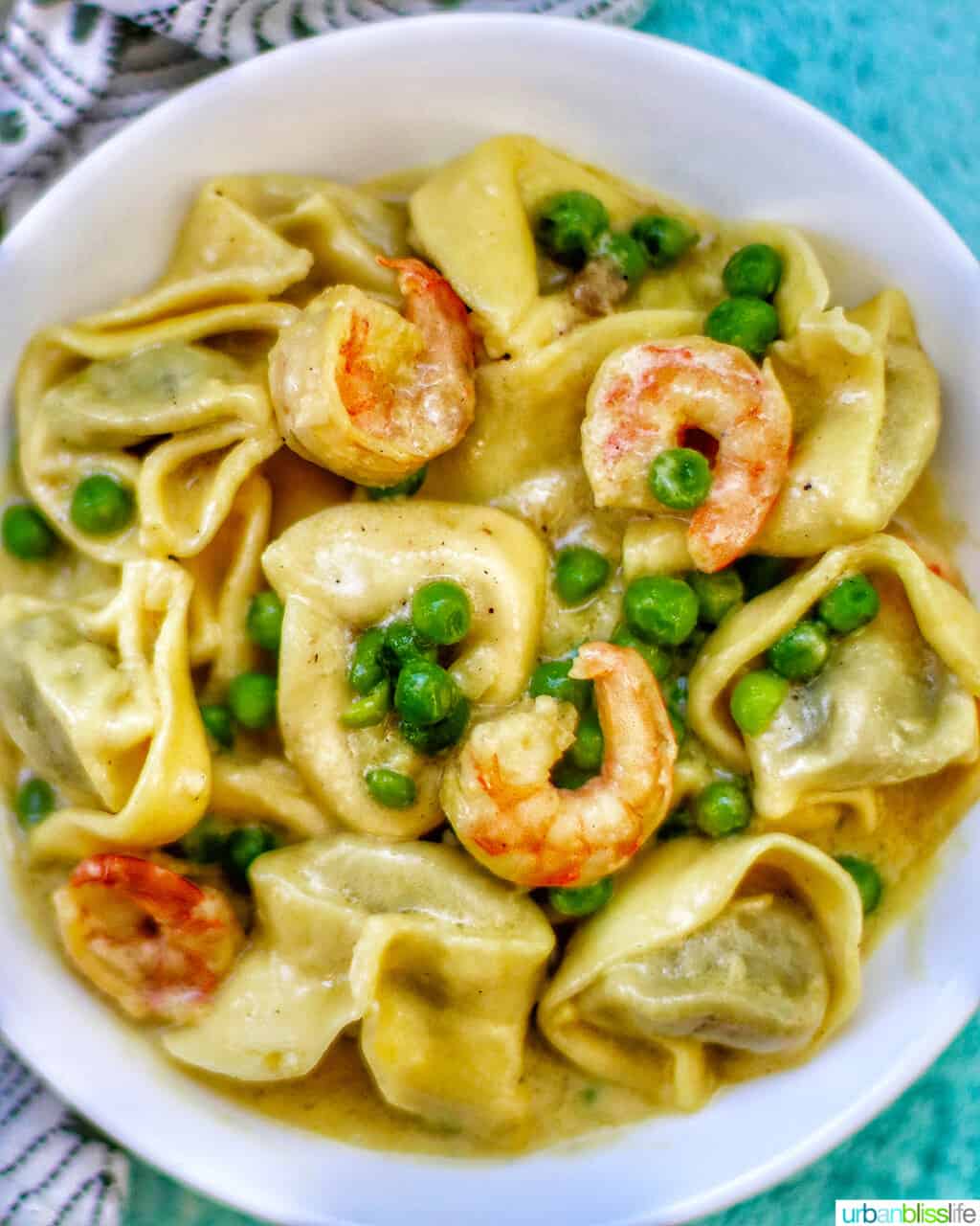 Dairy-Free Shrimp Tortellini with Peas in a bowl