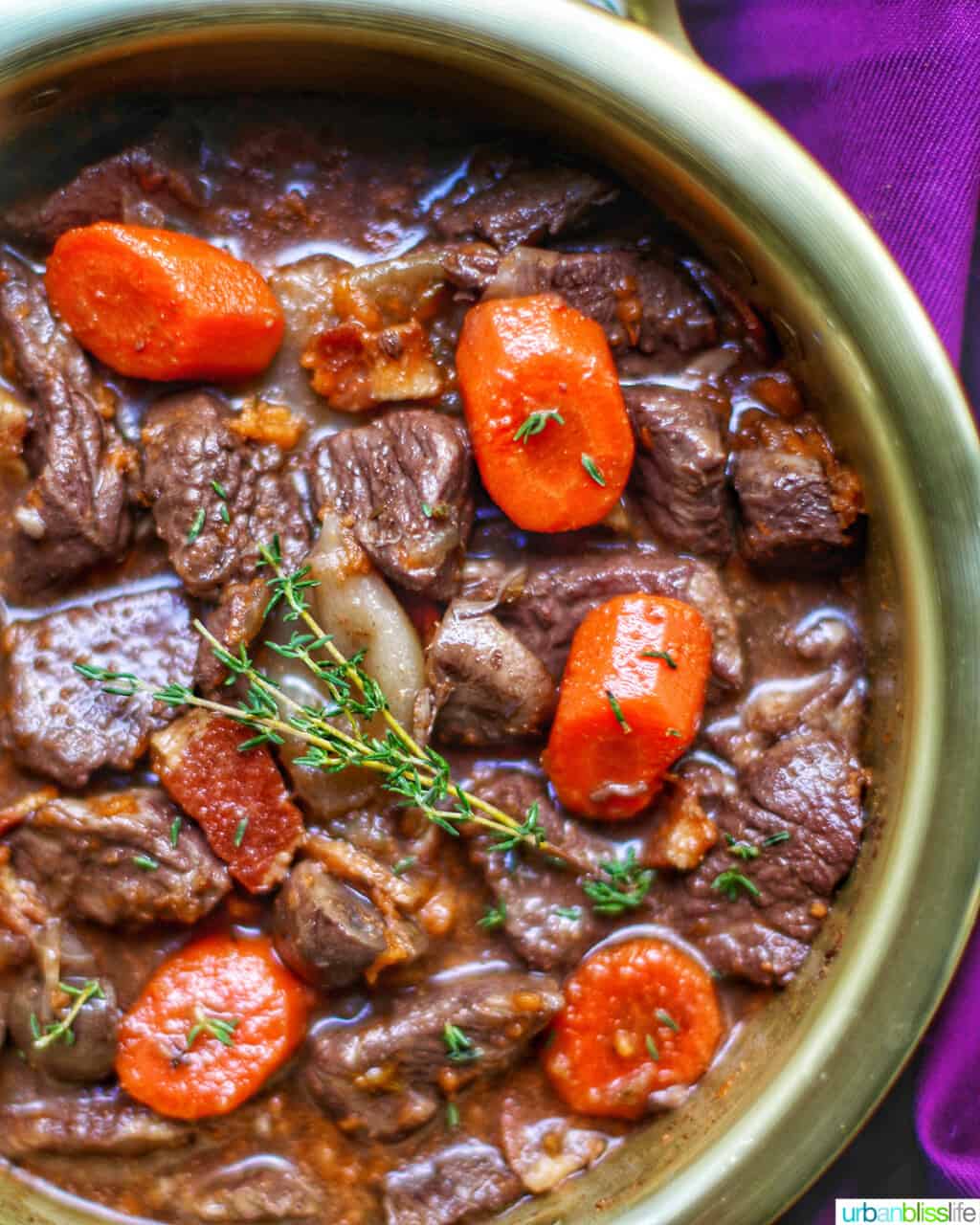 close up of beef bourguignon in big bowl