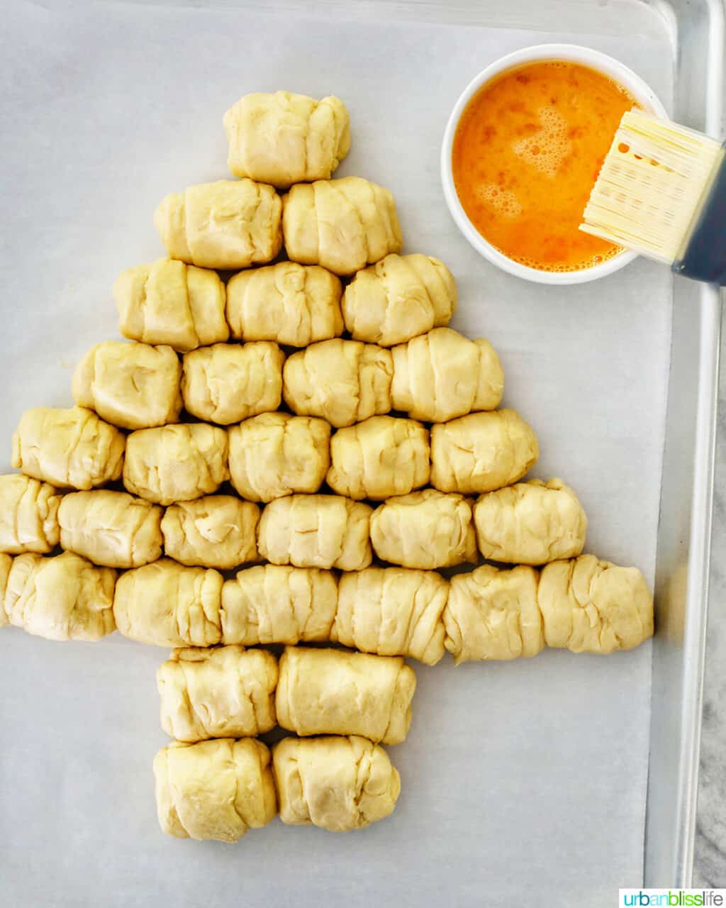 dough balls formed in shape of Christmas tree