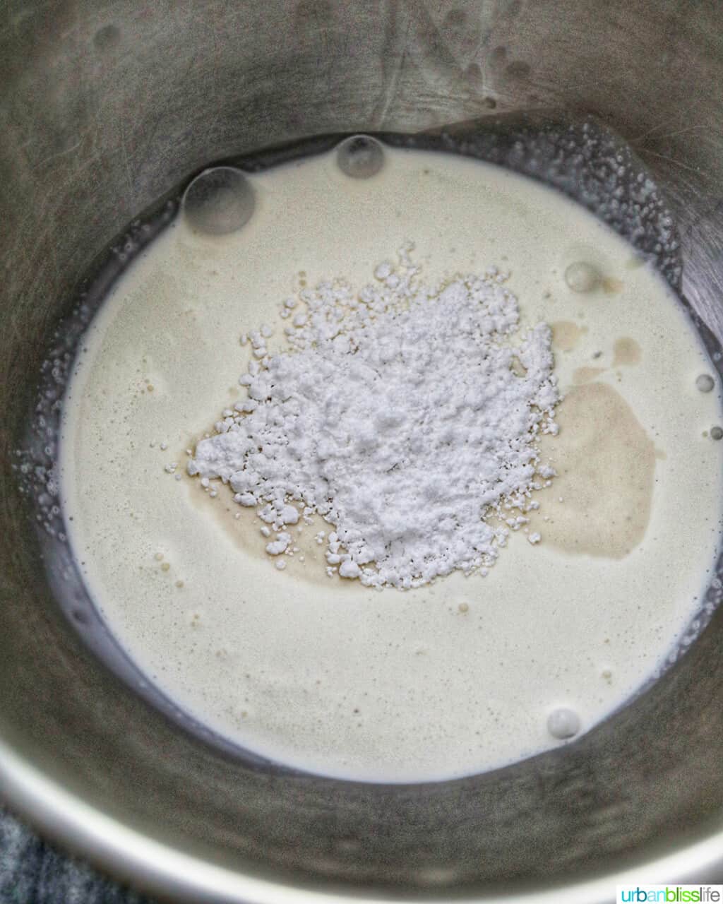mixing ingredients for eggnog whipped cream