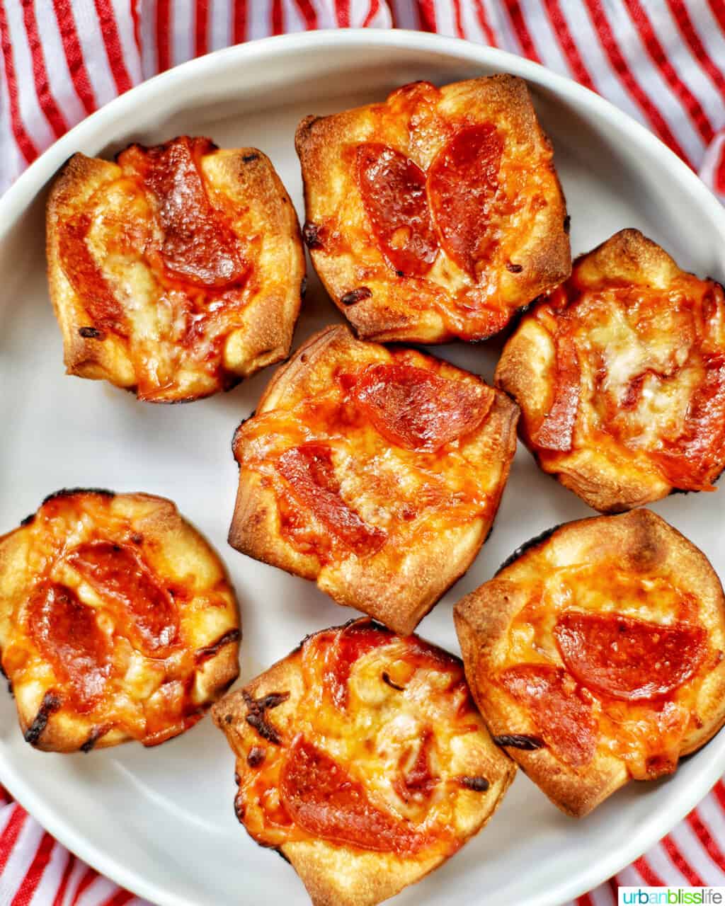 baked pizza cups in a white tray