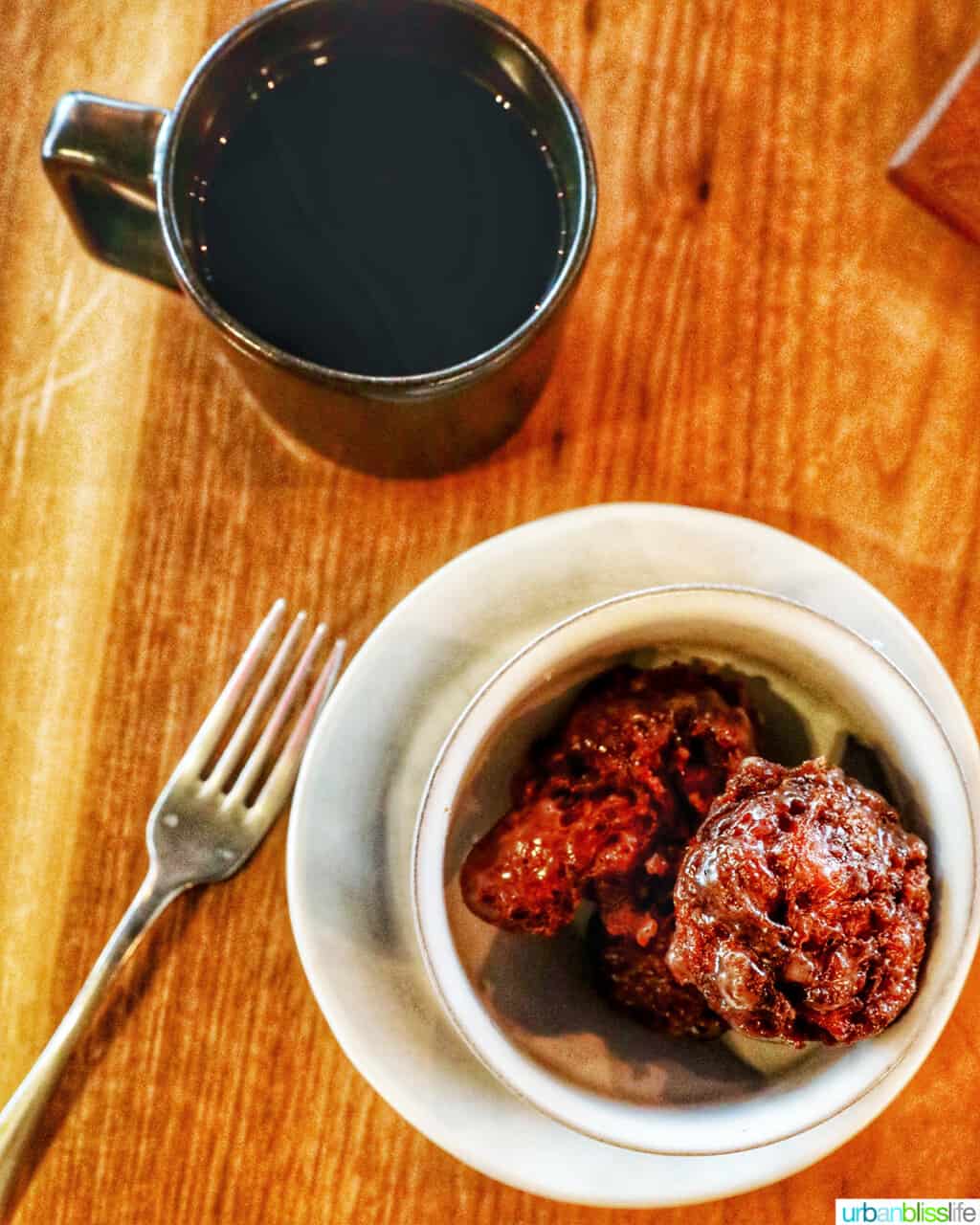 apple cider donuts and cup of coffee at Bullard Tavern