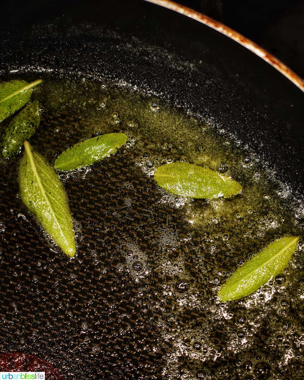 sage leaves crisping in a pan