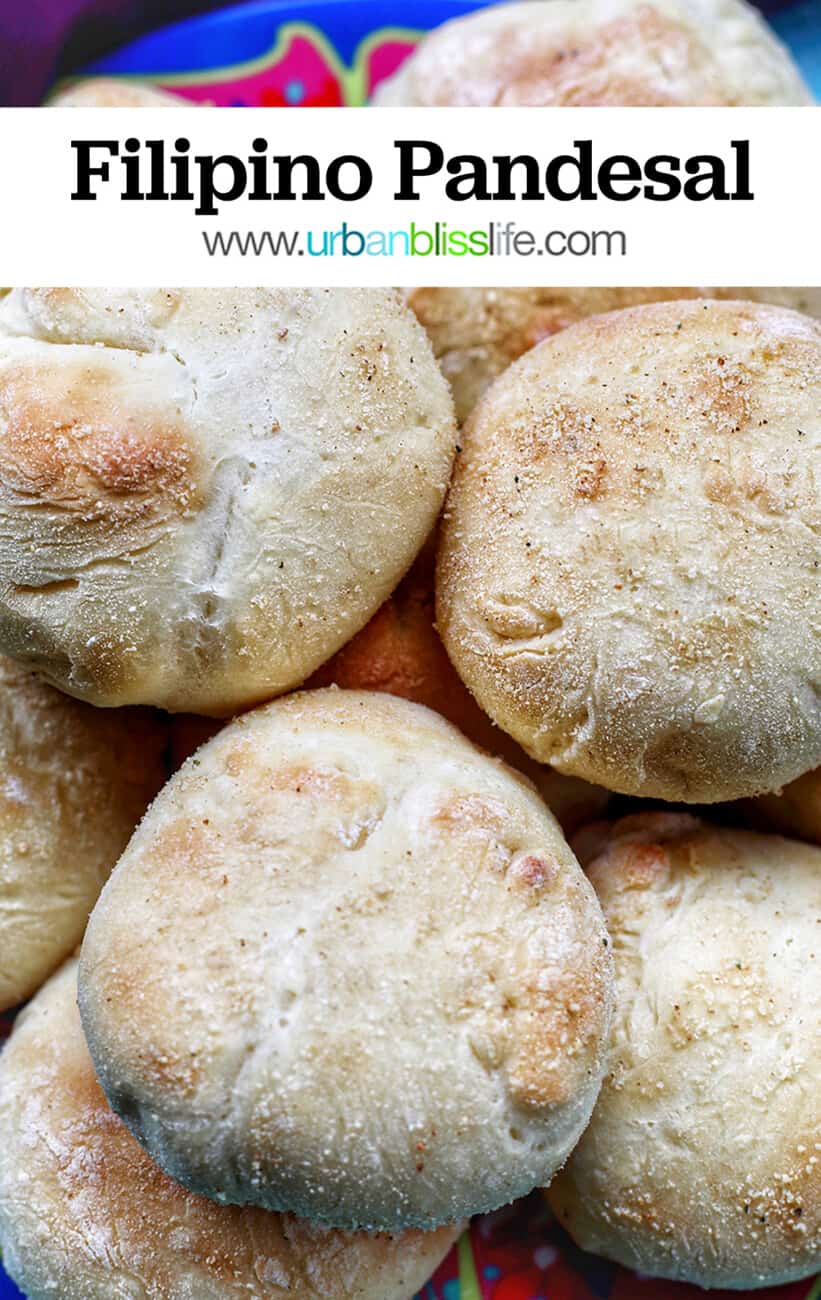 colorful plate with baked Filipino Pandesal rolls with text overlay