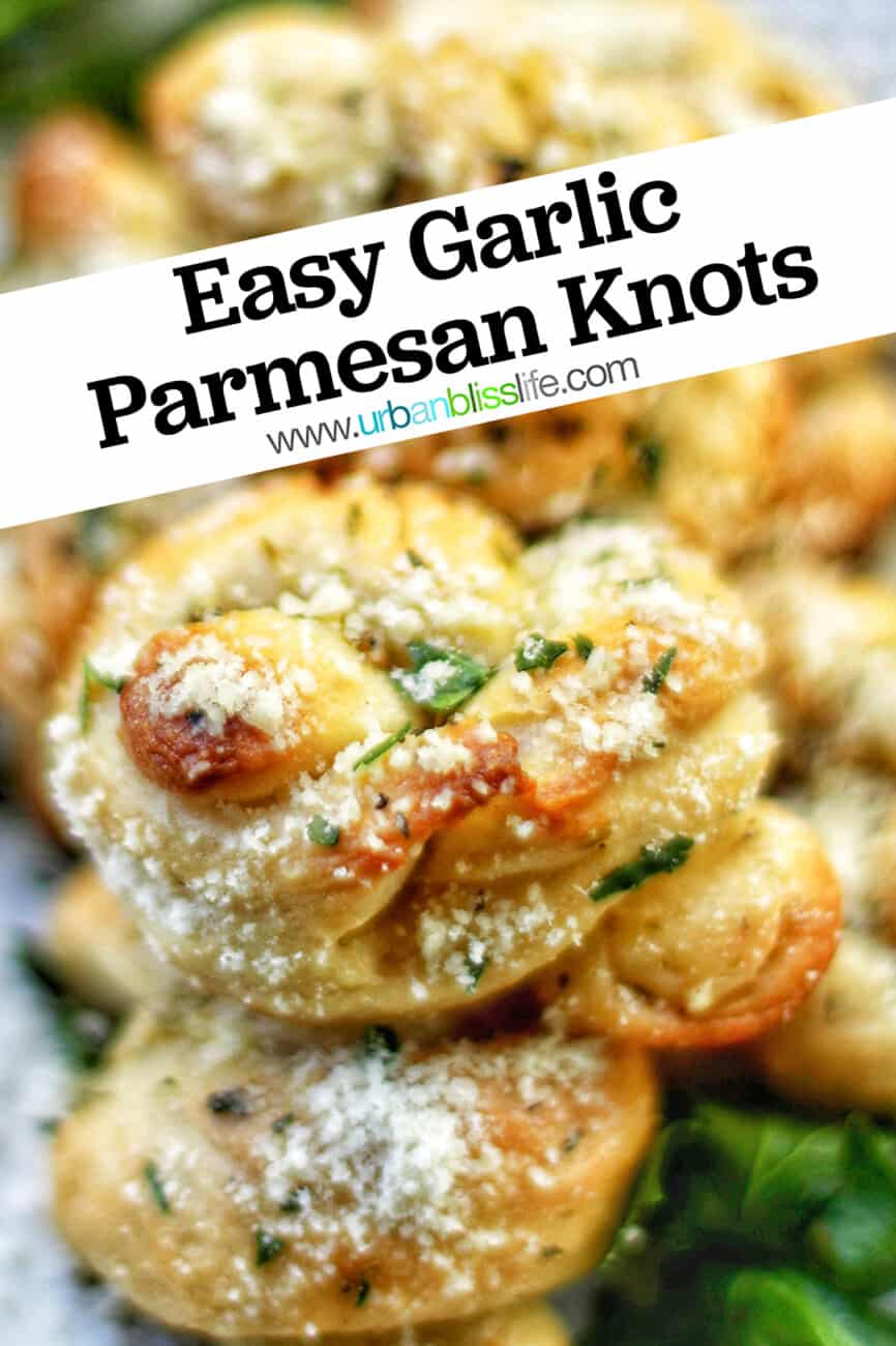 garlic parmesan knots on a white platter with text overlay.