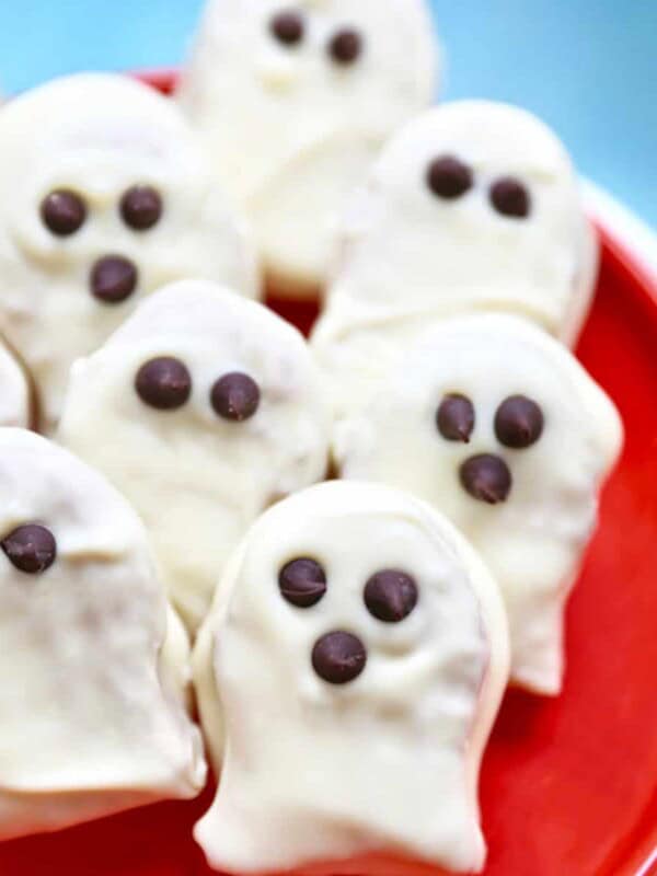 orange plate with Nutter Butter Ghost Cookies