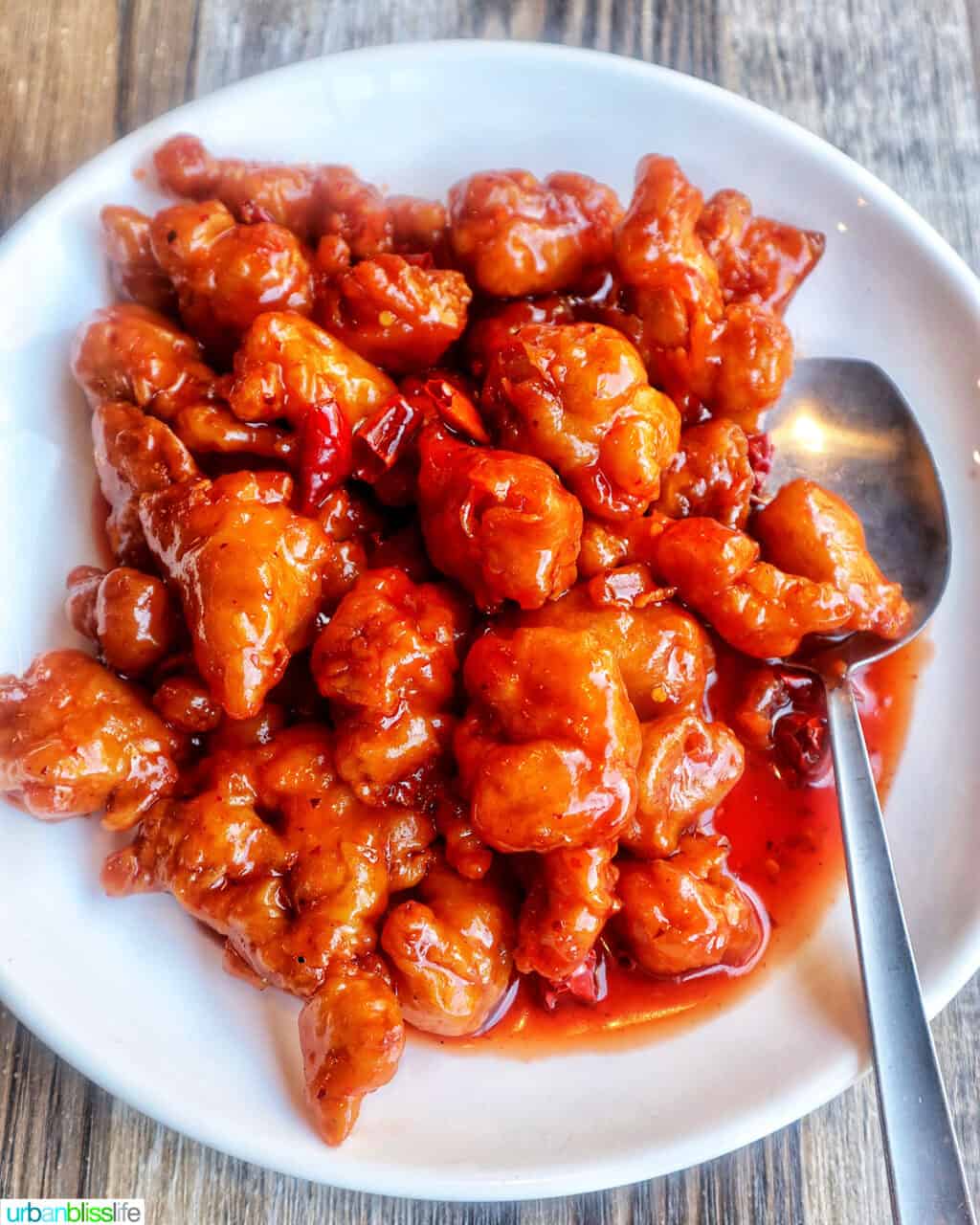mandarin chicken on a white bowl at Tasty Corner restaurant in Portland Oregon.