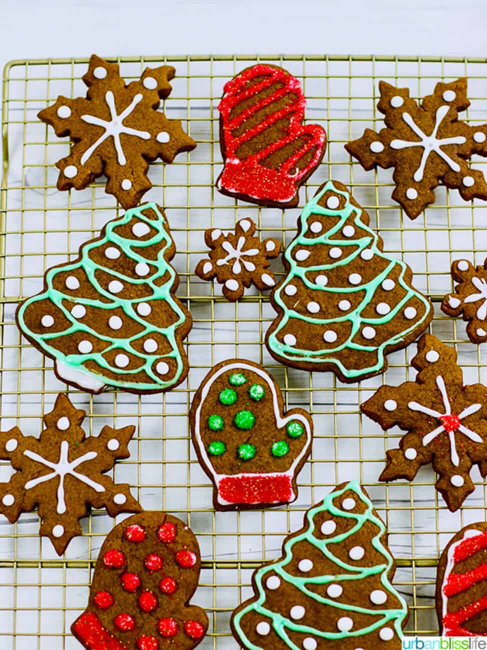 Soft Gingerbread Cookie Recipe - decorated cookies in holiday shapes