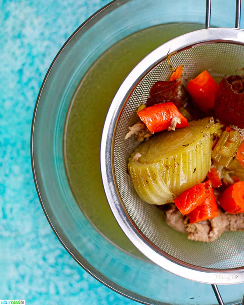 vegetable scraps in strainer