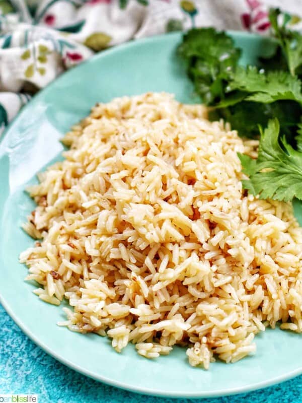 instant pot garlic rice on green plate