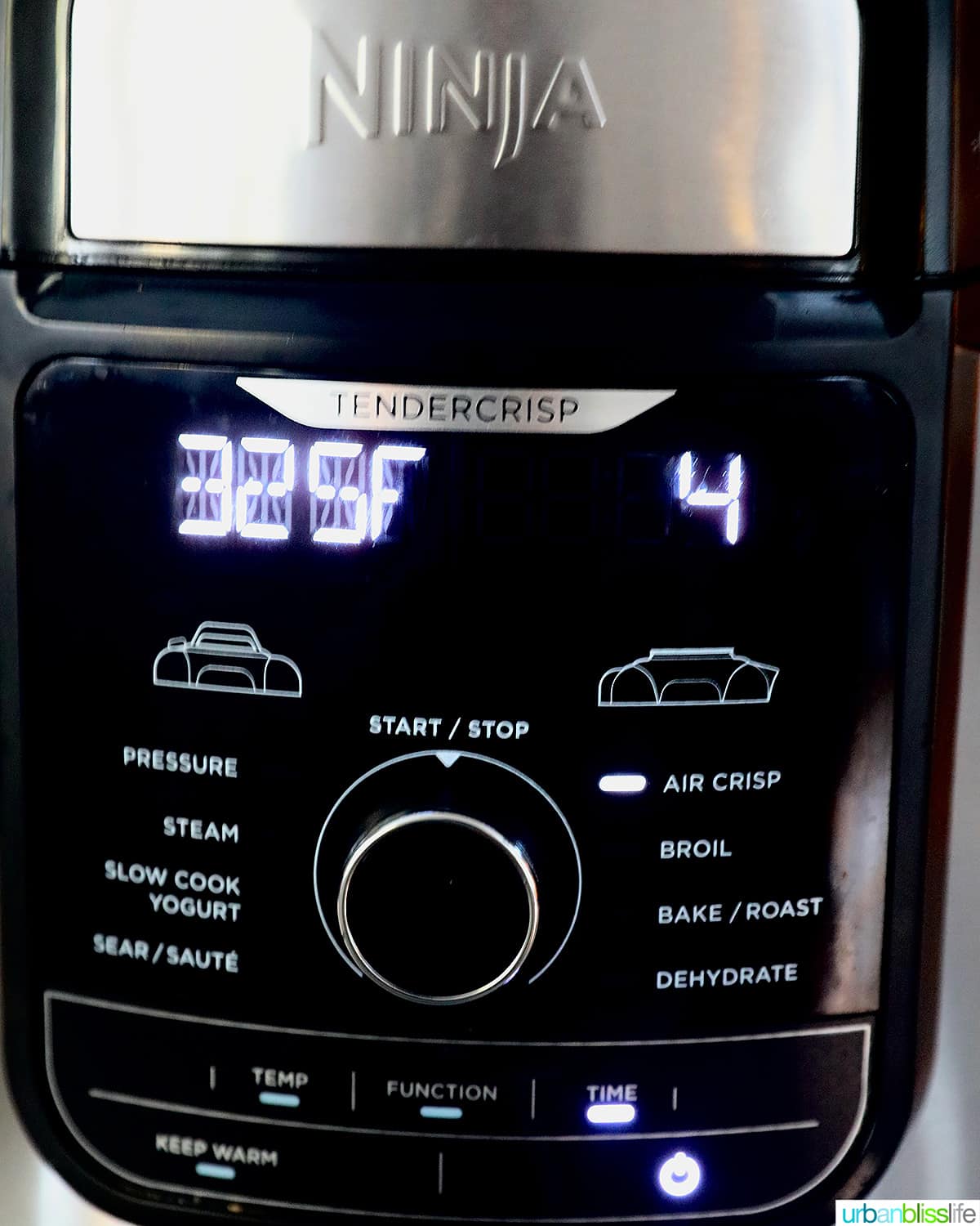 Ninja Foodi Air Fryer set to 325 degrees for 4 minutes.