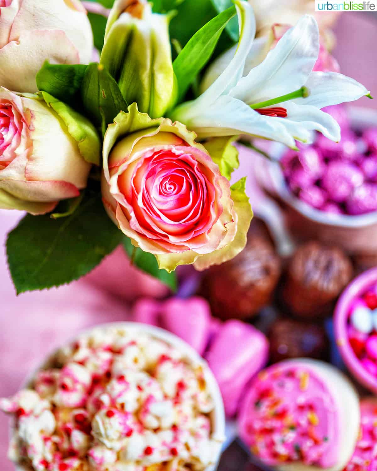 pink roses white lillies and Valentine's Day Dessert Board