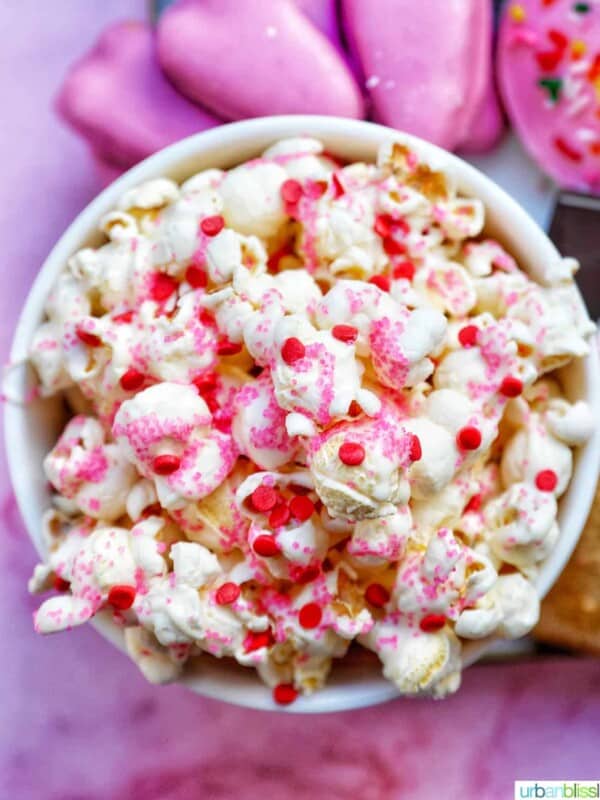 Valentines Day Popcorn in a bowl with pink background
