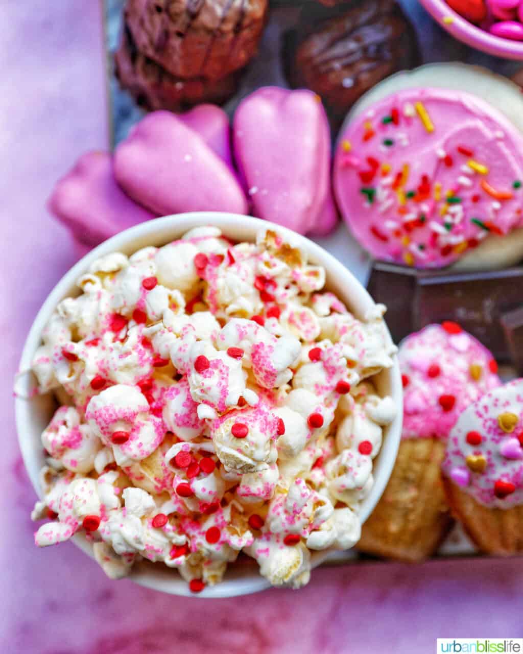 Valentines Day Popcorn in corner of Valentine's Day dessert tray