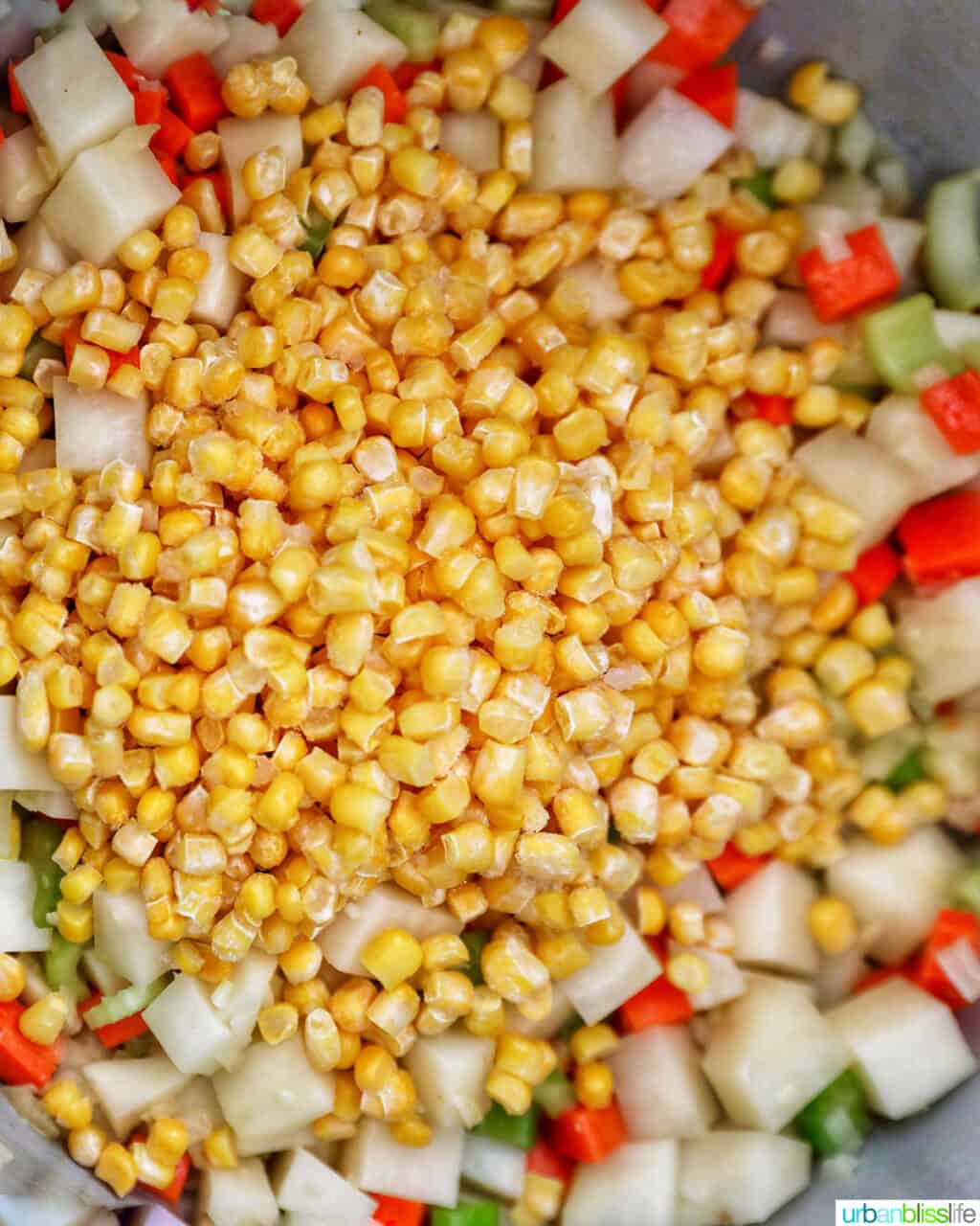 corn added to veggies in instant pot
