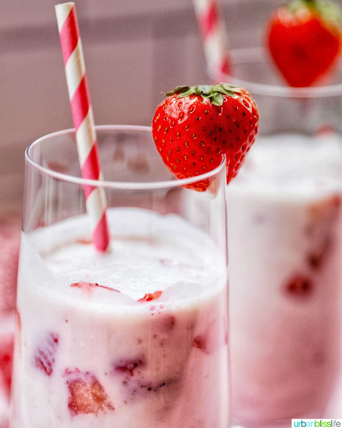 closeup of top of two glasses of Korean Strawberry Milk