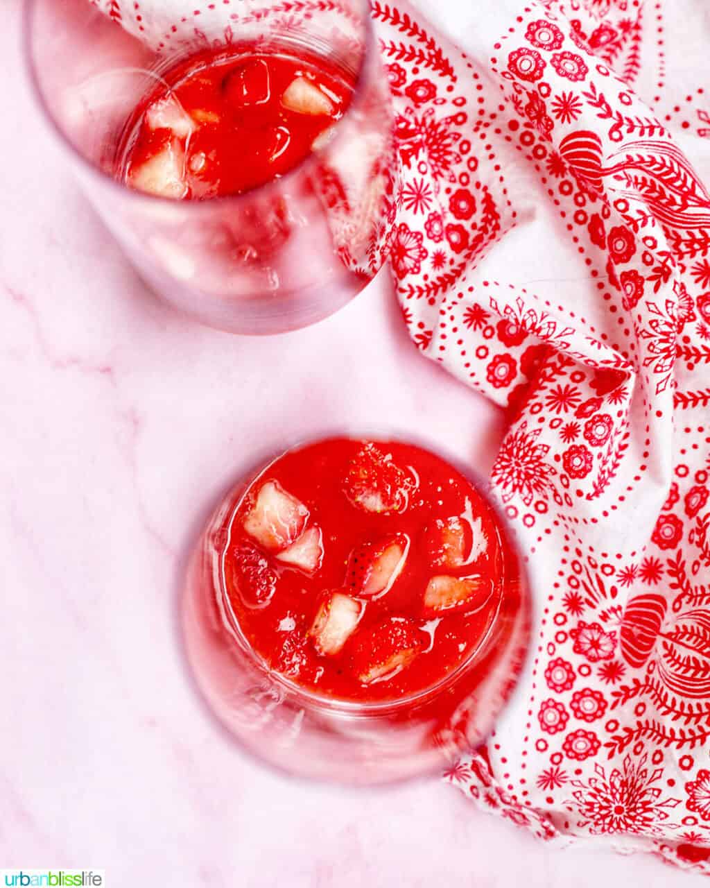 strawberies added to puree in glasses