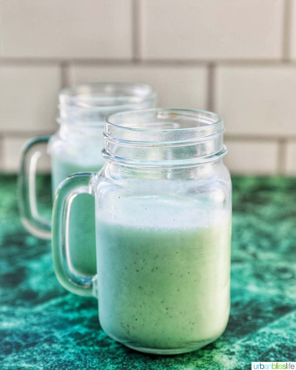 shamrock shakes in two glasses