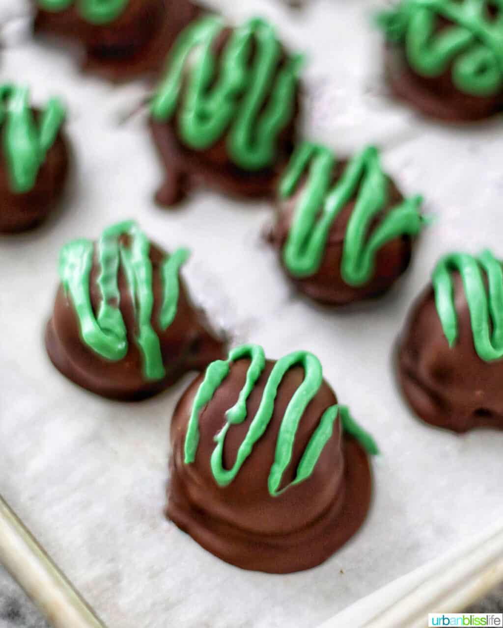 green chocolate drizzle over mint oreo truffles