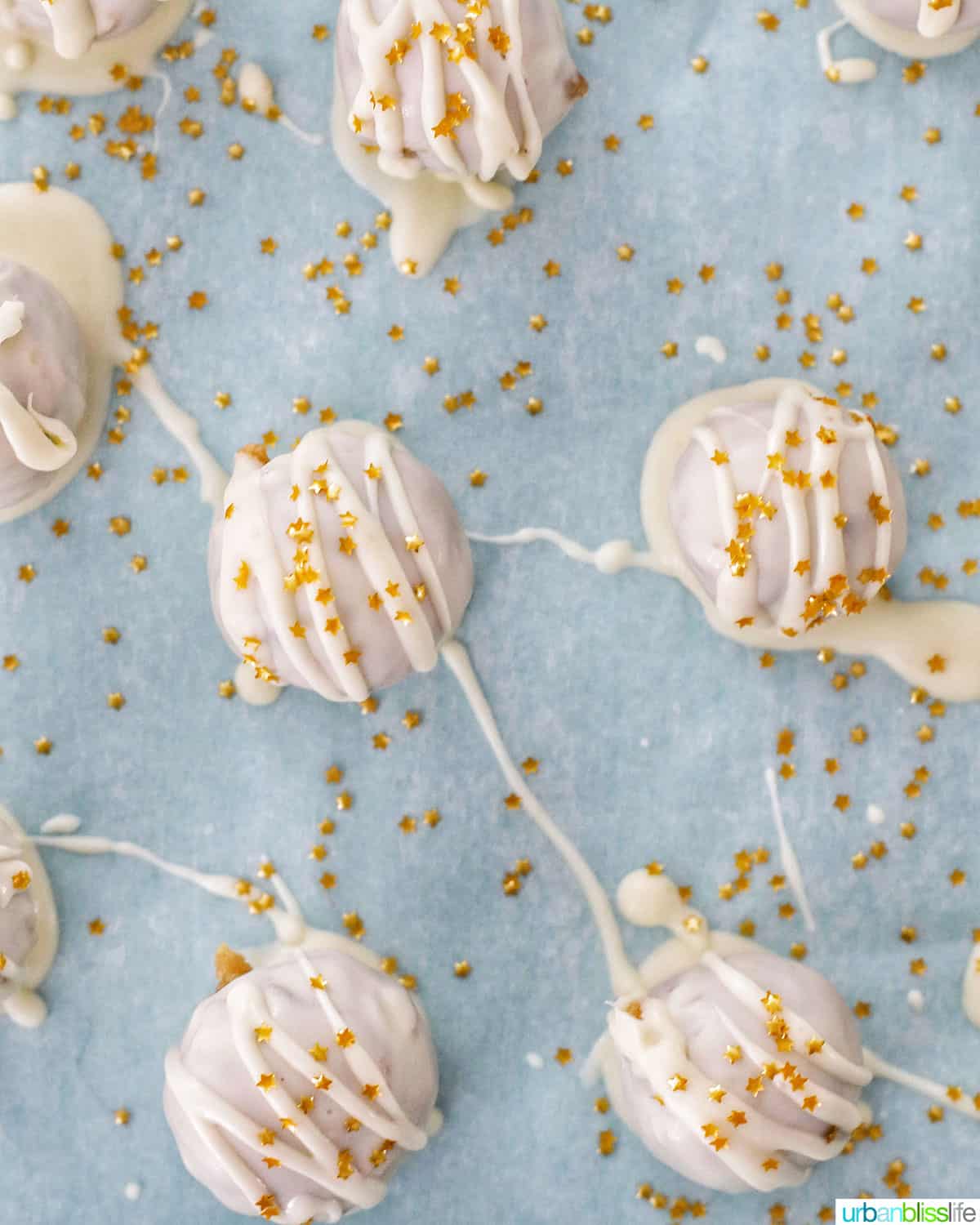 decorating chocolate chip cookie dough truffles with edible gold stars