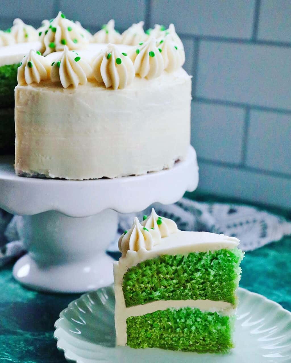green velvet cake with slice on a plate
