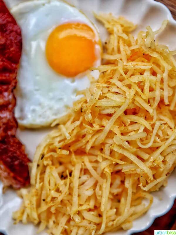 shredded air fryer hash browns with bacon and eggs