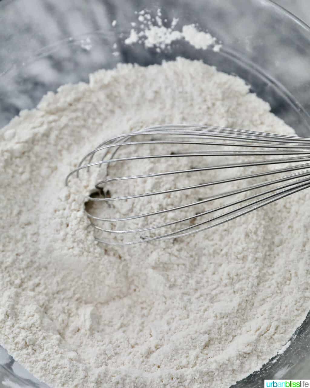 whisking together dry ingredients