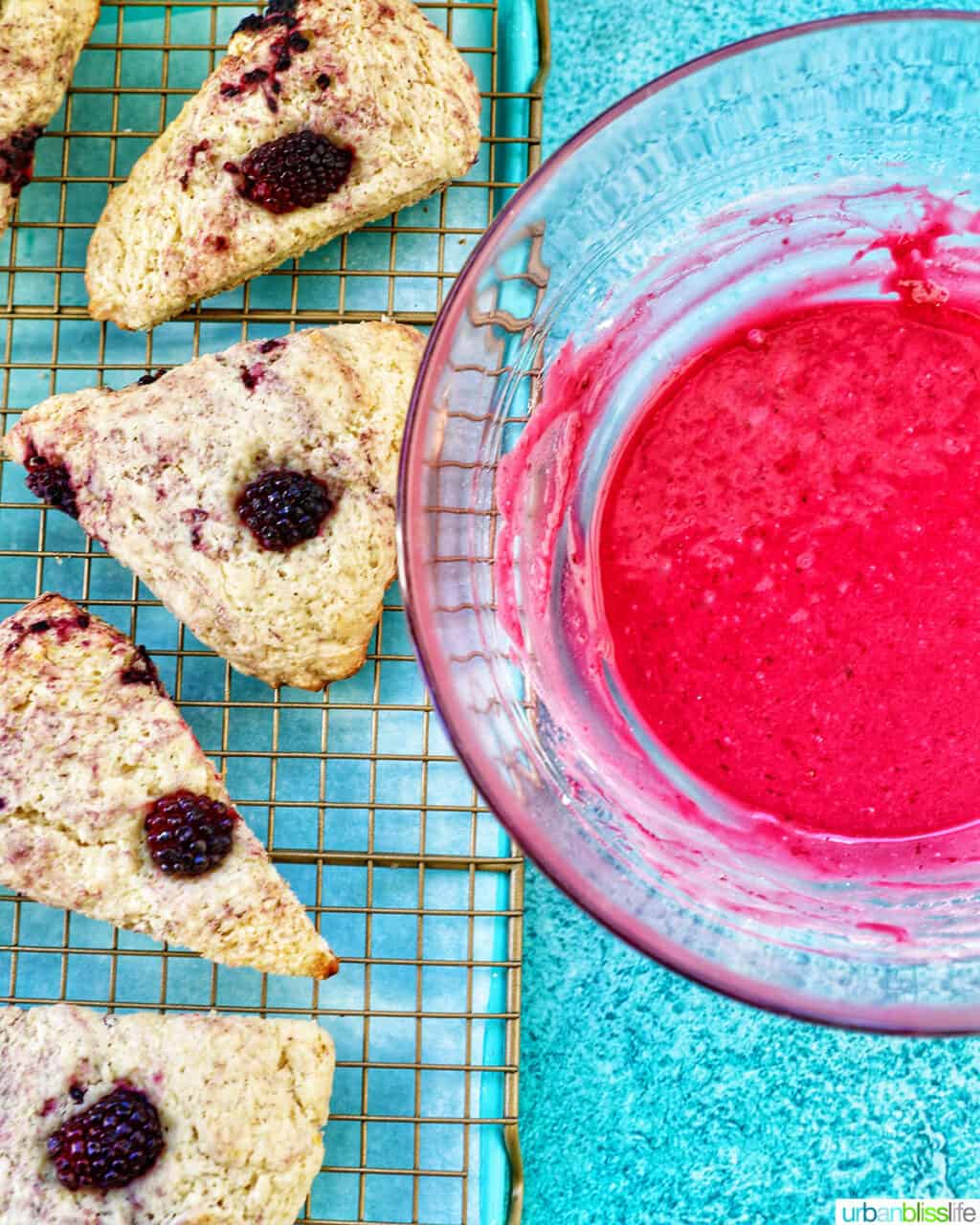 blackberry scones with a bowl of blackberry glaze