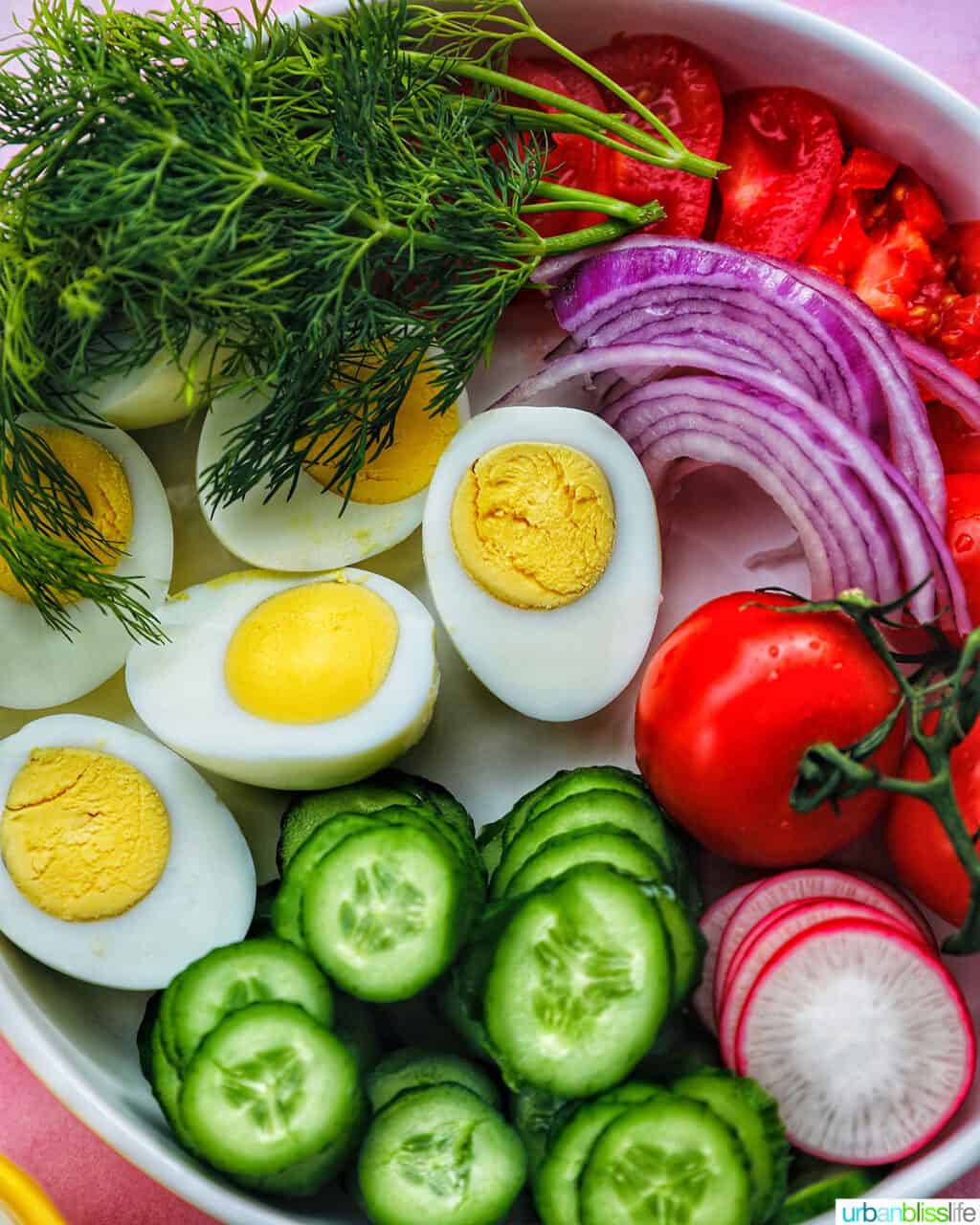 sliced vegetables and hard boiled eggs