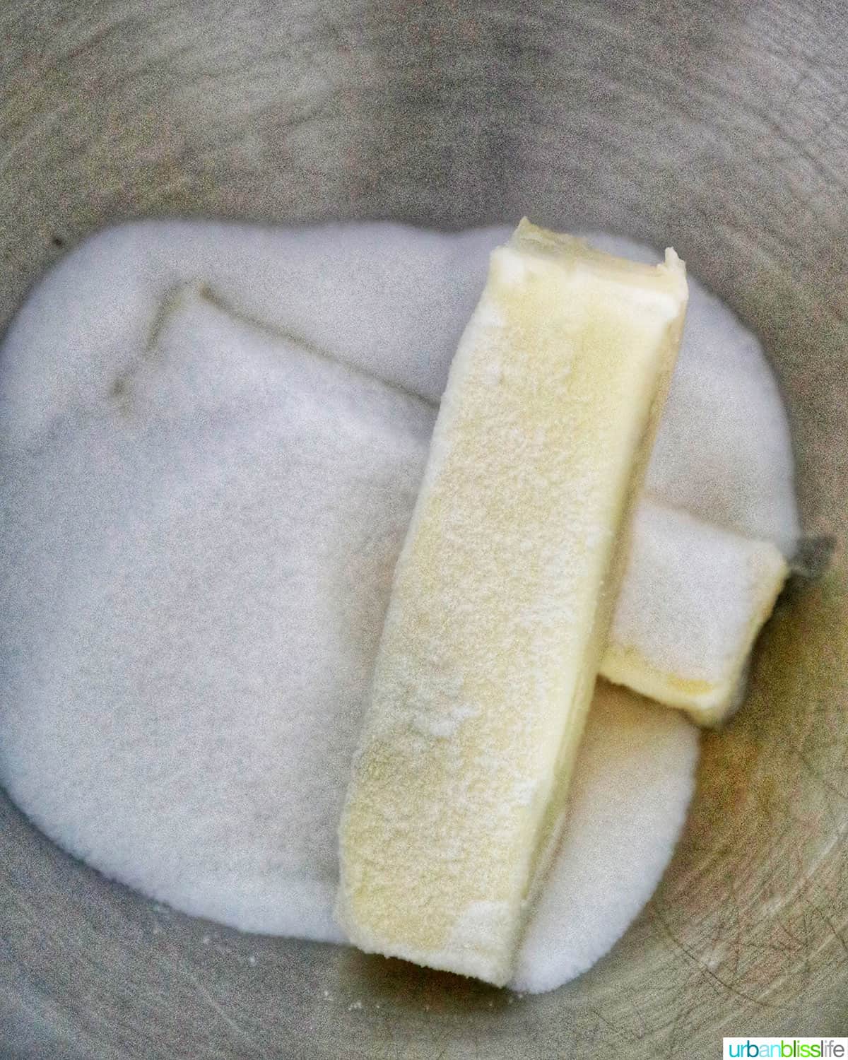 butter and sugar in mixer.