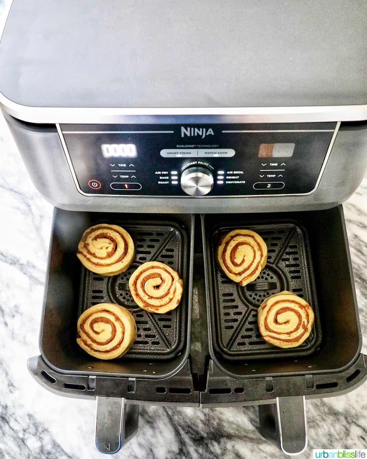 air fried cinnamon rolls in the ninja foodi air fryer baskets
